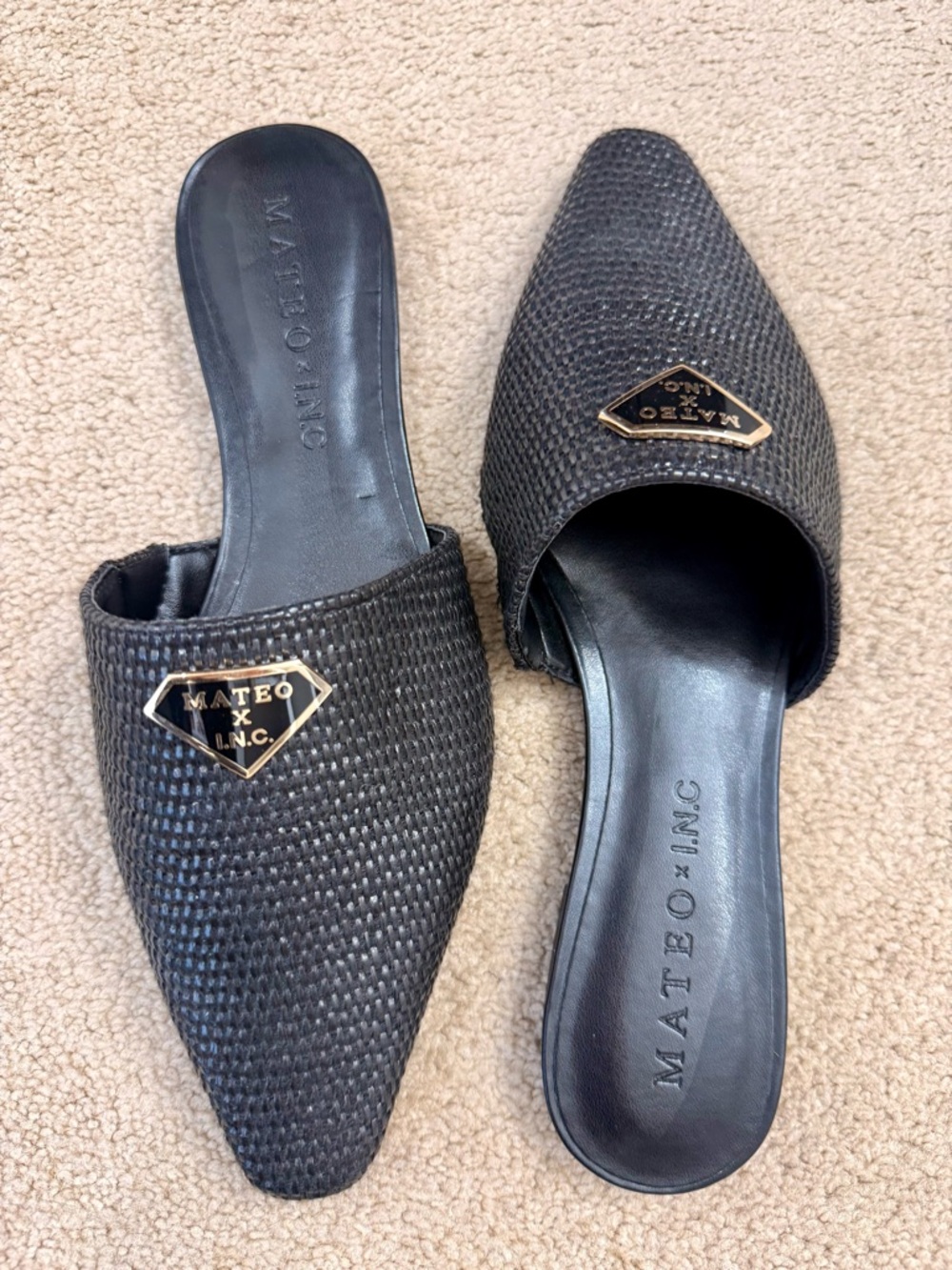 Mateo New York Black Woven Pointed Slide Mules with Gold Emblem